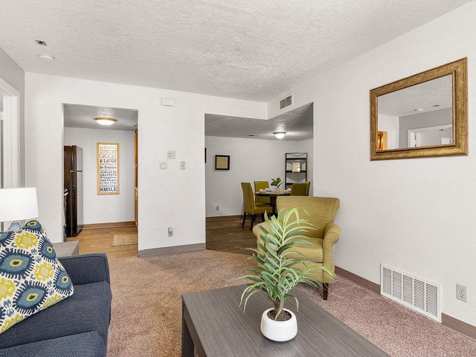 a living room with a couch and a coffee table